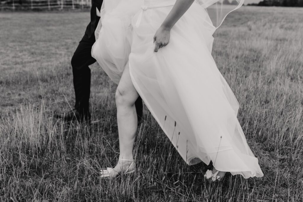 Evening photos of the couple on the lawn at Gosfield Hall