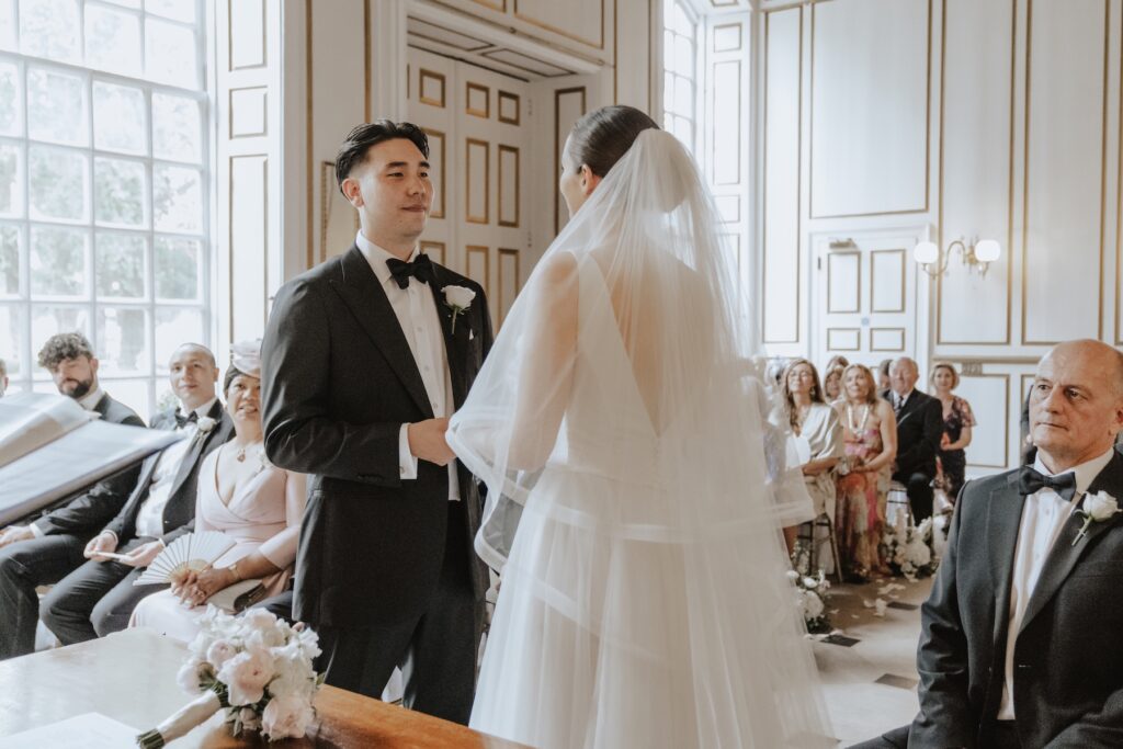 The couple during their ceremony at Gosfield Hall
