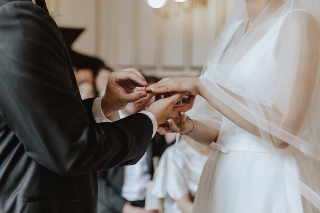 Exchanging rings at Gosfield Hall in Essex