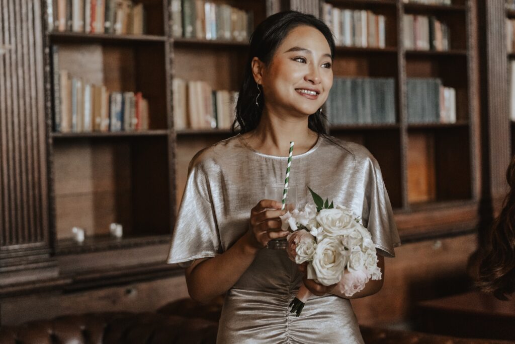 Guest candids in the library during cocktail hour