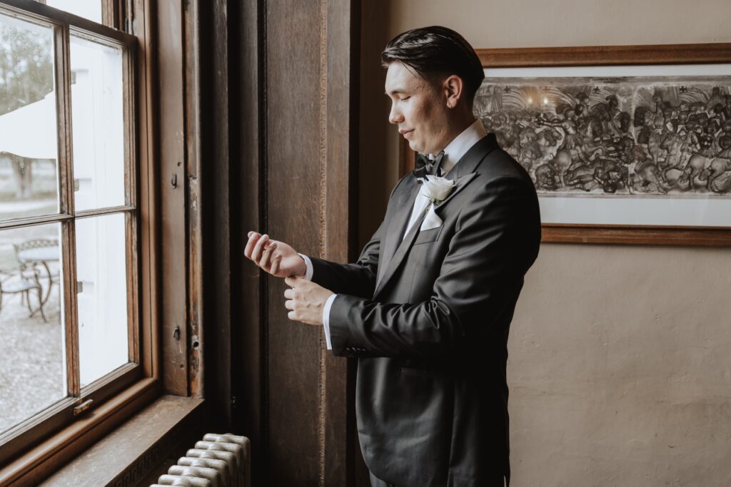 The groom getting ready at Gosfield Hall