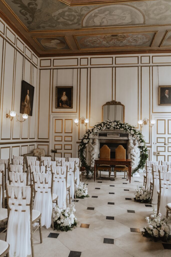 Wedding photographer at Gosfield Hall in Essex capturing the room prep