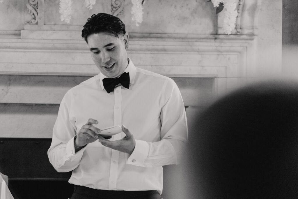 The groom giving his speech at banquet room in Gosfield Hall