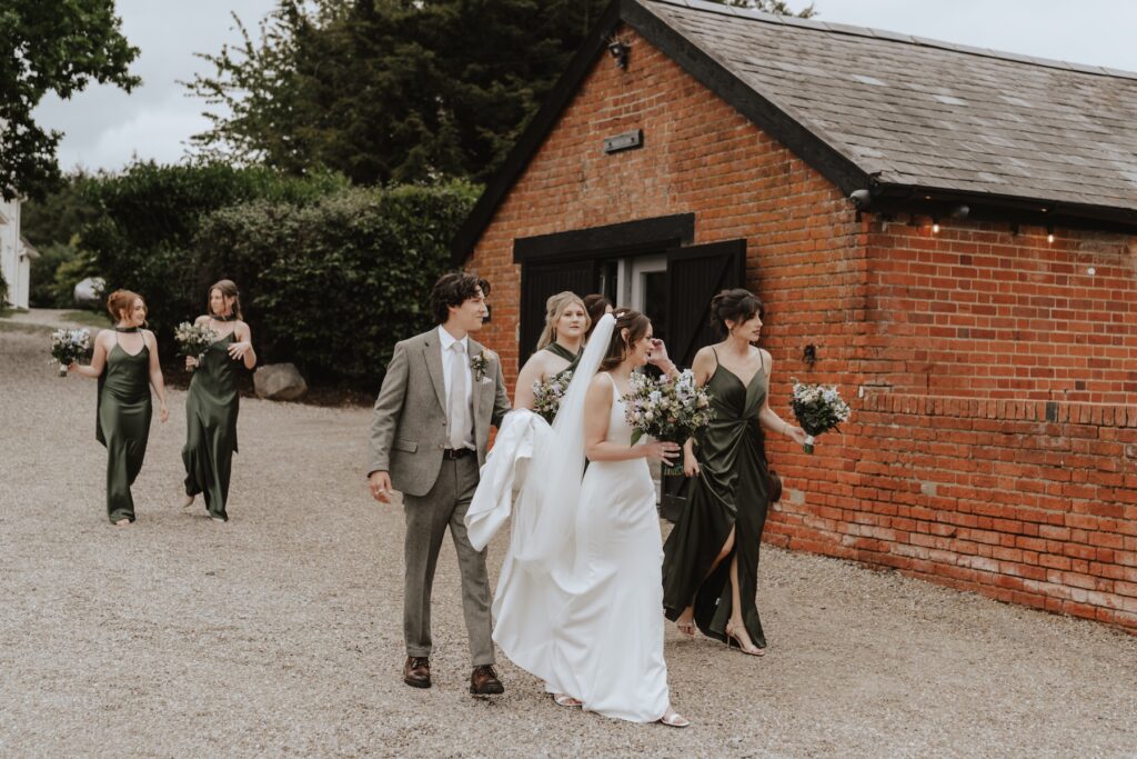 Bride and bridesmaids getting ready in refurbished house at Copdock Hall, Suffolk wedding morning