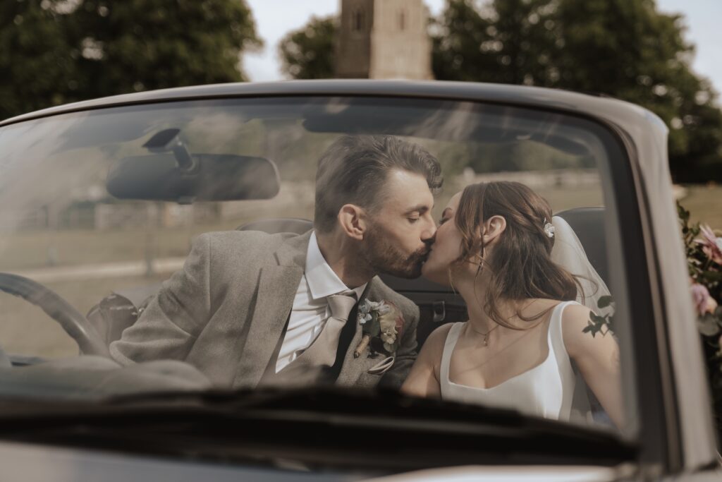 Bride and groom during day portraits outside Copdock Hall