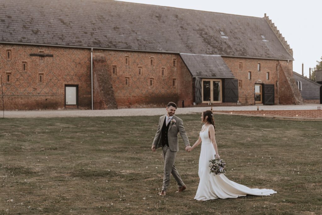 Couples portraits outside Copdock Hall in Suffolk