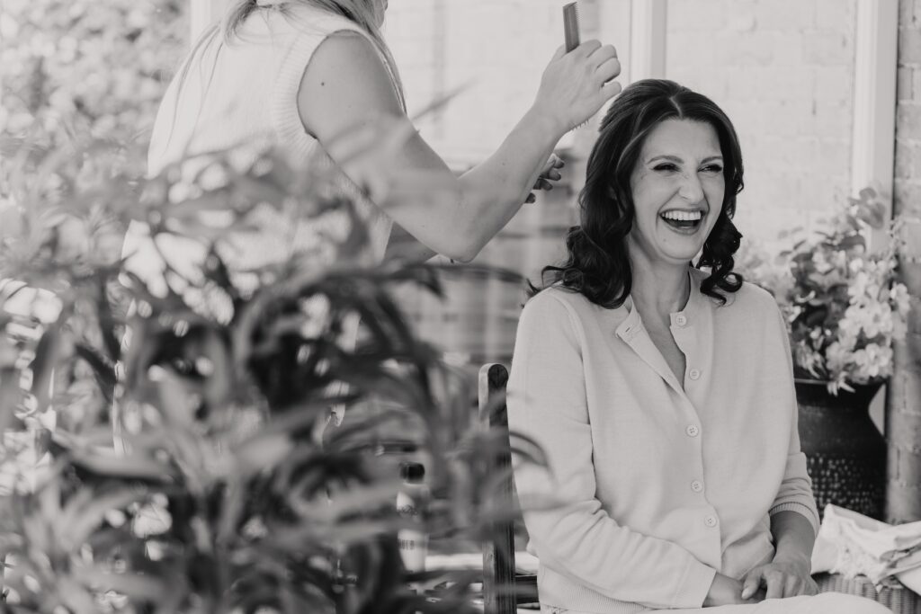 Norfolk wedding photographer capturing bridal prep at Godwick Hall