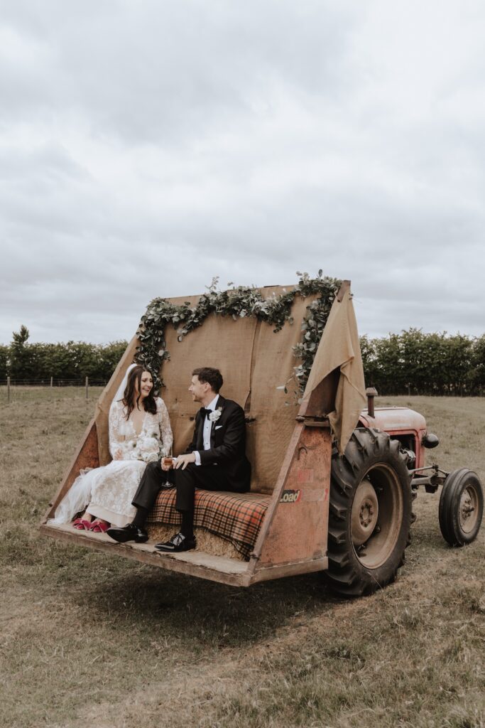 Godwick Hall tractor ride during a Norfolk wedding