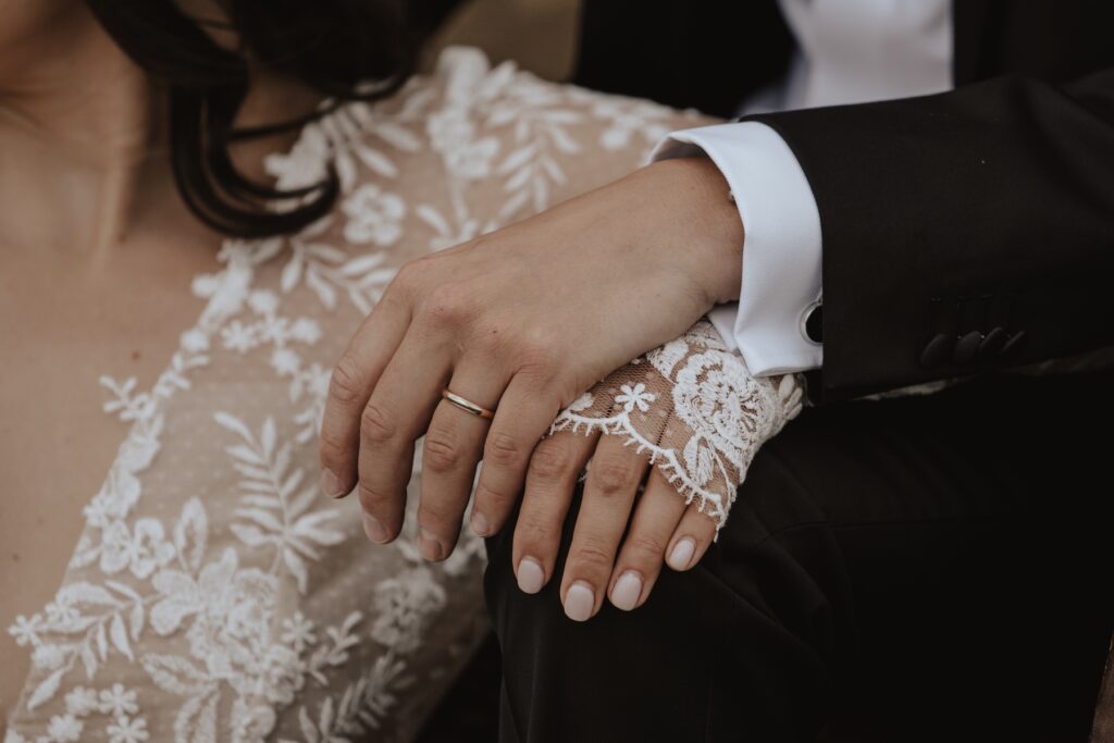 Close ups of hands during couples portraits in Norfolk