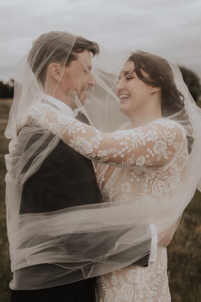 Wedding photographer in Norfolk capturing couples portraits at Godwick Hall