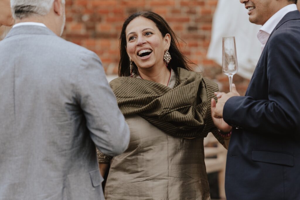 Godwick Hall wedding photographer capturing guests portraits in Norfolk
