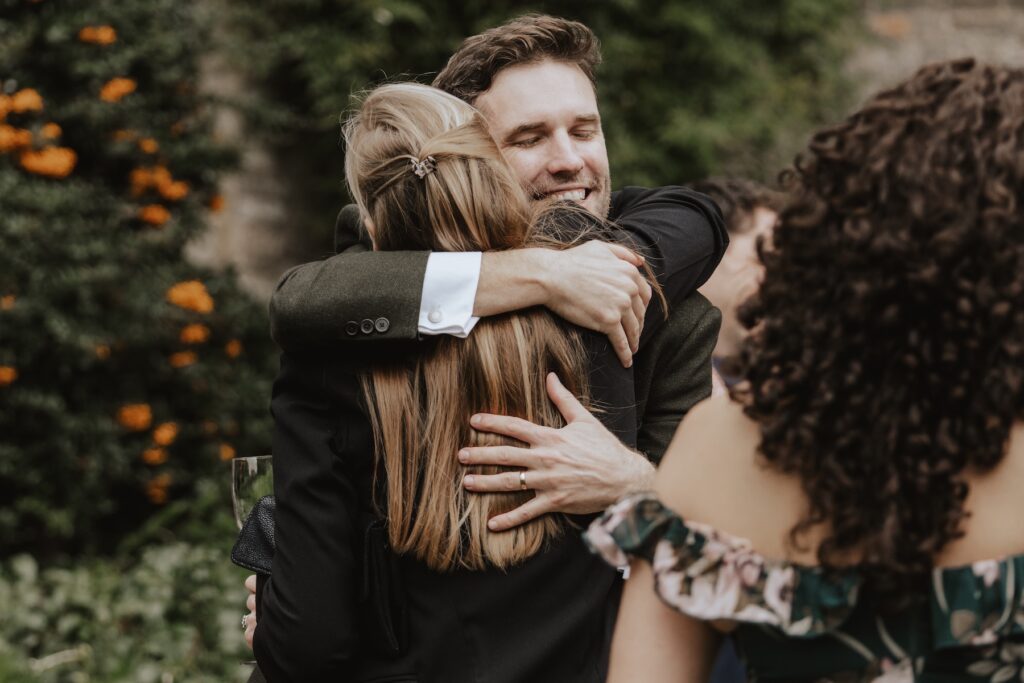 Guests enjoying champagne on the Hengrave Hall terrace