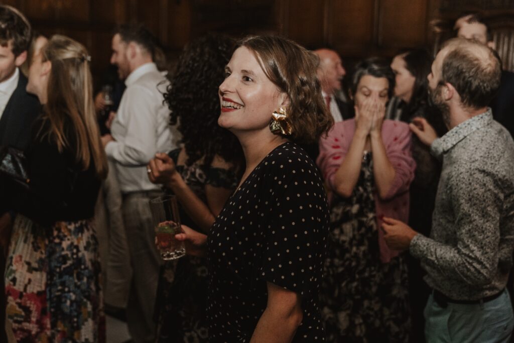 Suffolk wedding photographer capturing guests on the dance floor at Hengrave Hall
