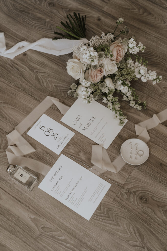 Close-up of bridal bouquet featuring white and blush florals