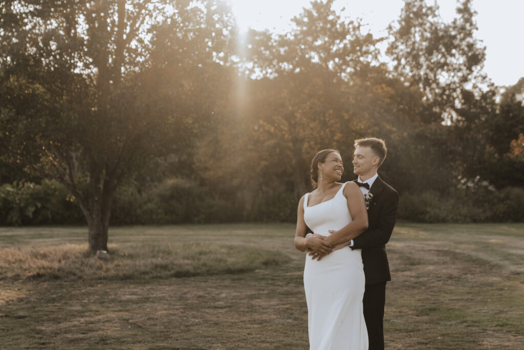 Golden hour wedding portraits by Essex wedding photographer at High House
