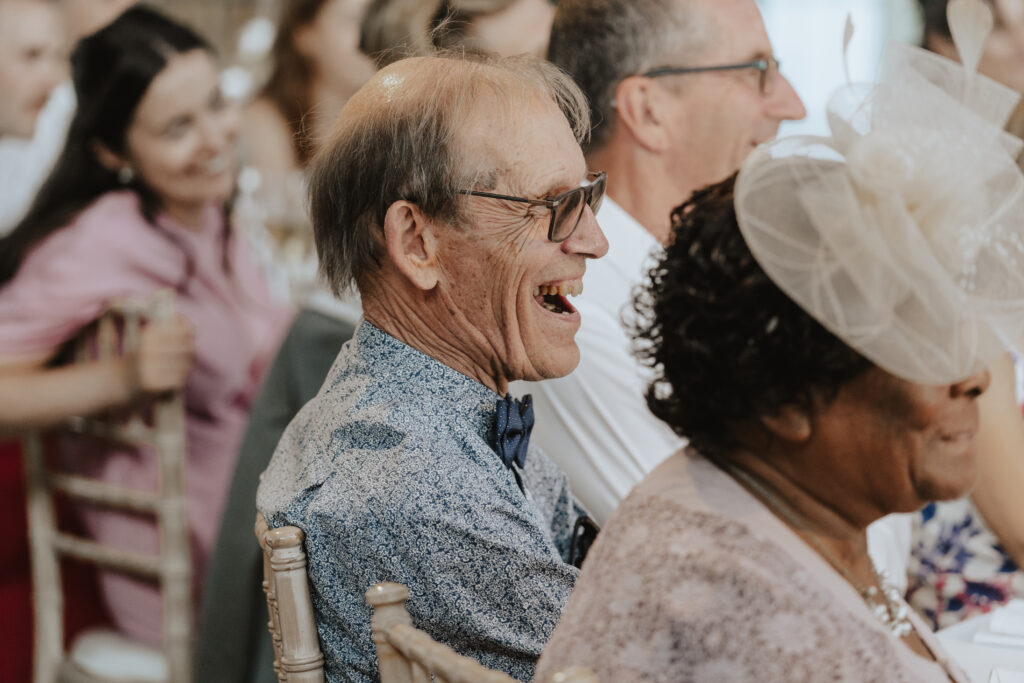 High House wedding with guest laughter during the best man’s speech
