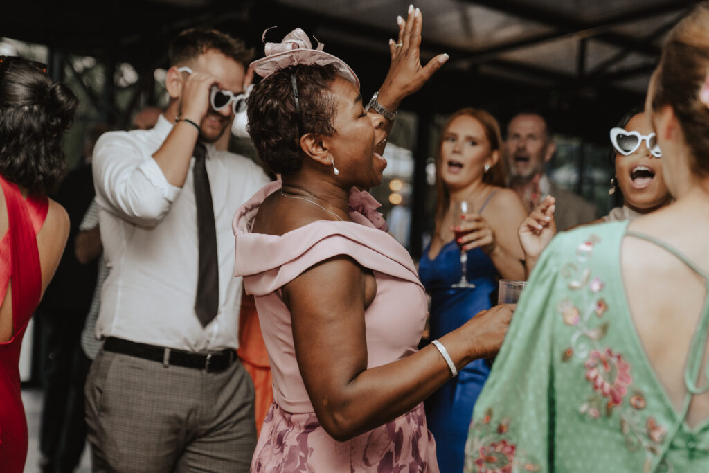 Guests dancing and celebrating on the High House dance floor