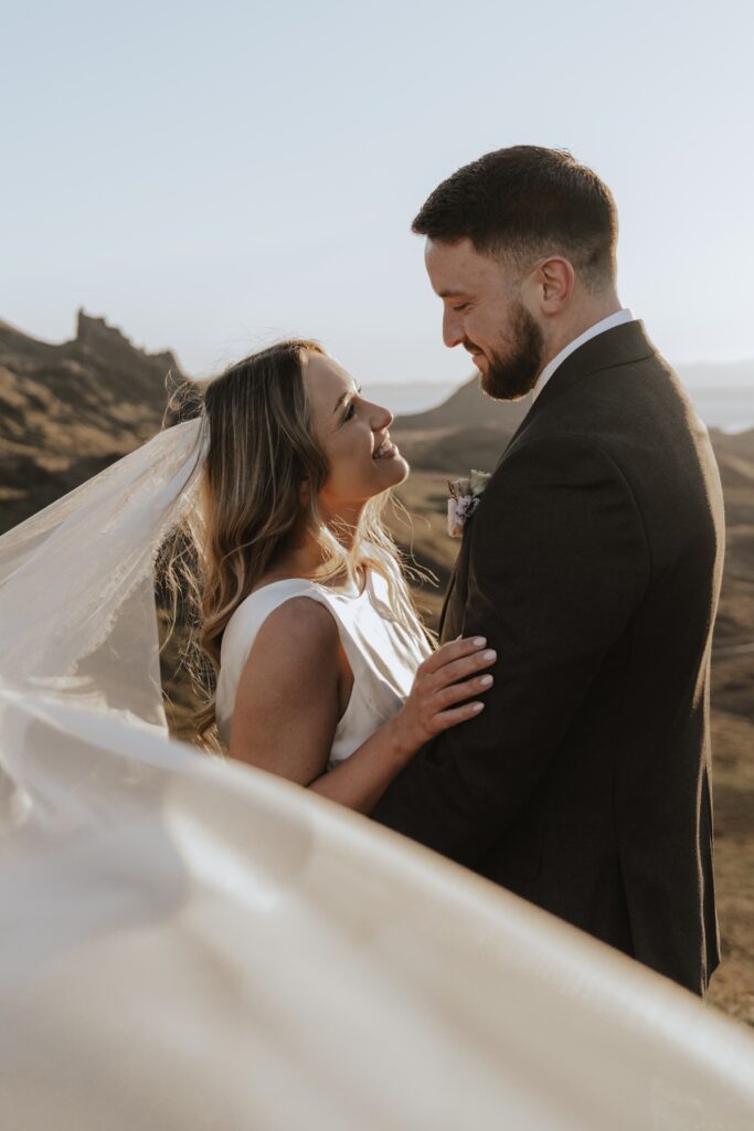 Scotland elopement photographer capturing golden sunrise portraits at Quiraing