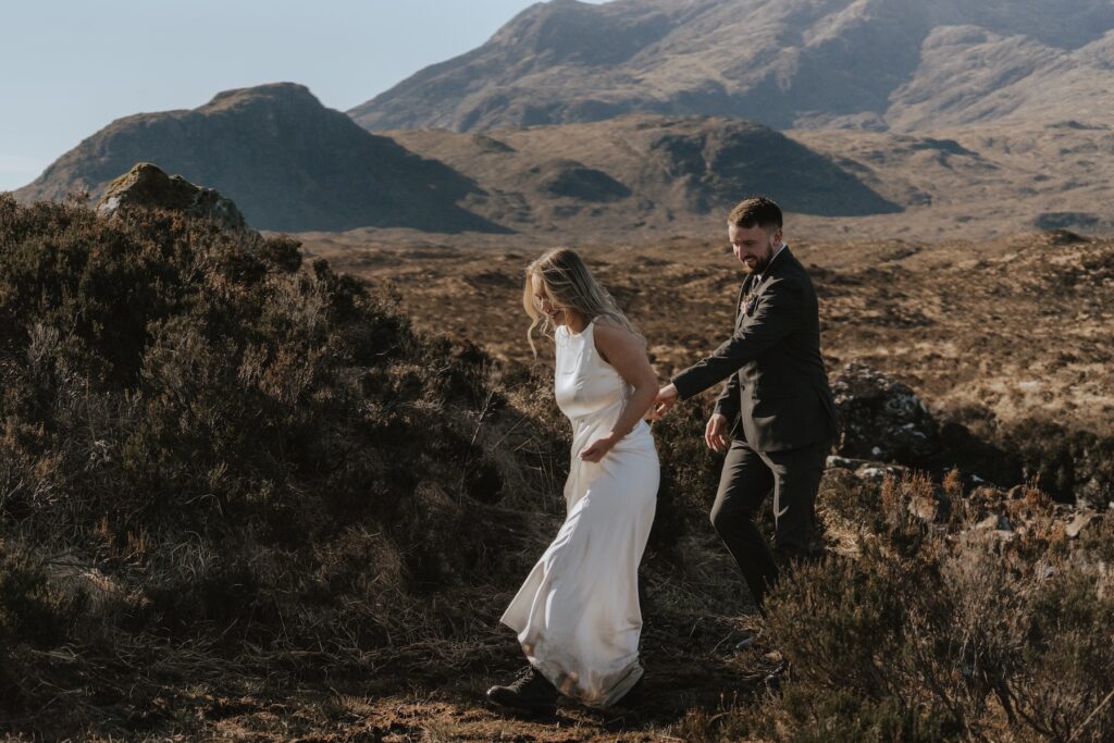 Isle of Skye elopement portraits near Sligachan Bridge under clear blue skies