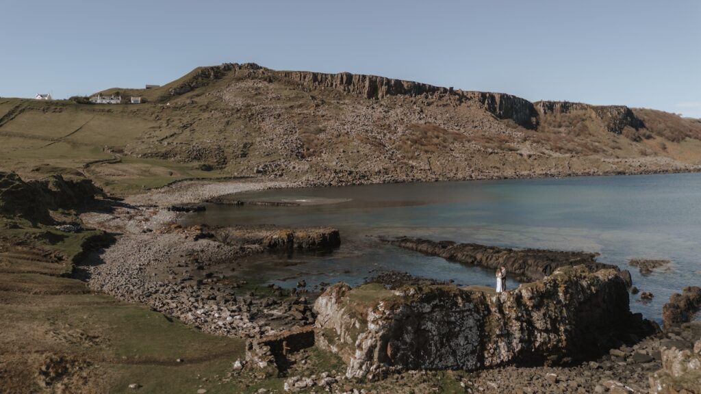 Scotland elopement photographer capturing couple exploring hidden shore at Brother’s Point