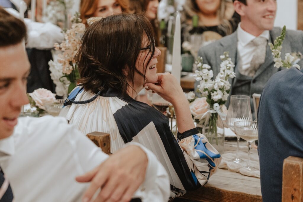 Candid Suffolk wedding photography capturing joy and laughter at Jimmy’s Farm