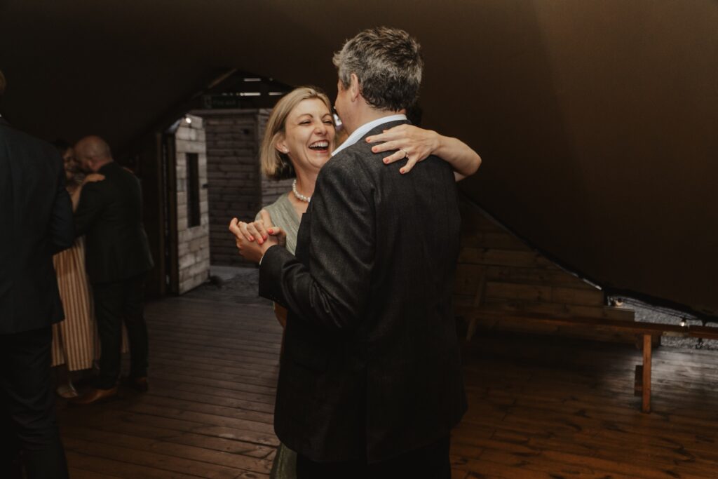 Evening party photos of guests dancing at Jimmy’s Farm wedding with dancing and celebration