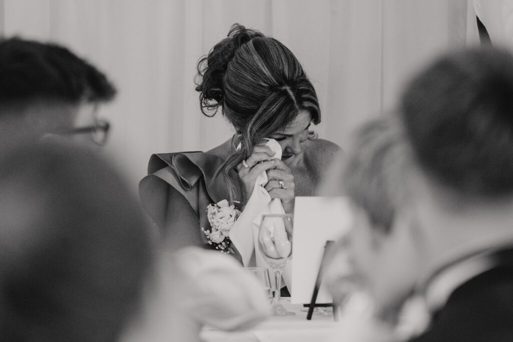 The groom's mum crying at the groom's speech at Seckford Hall