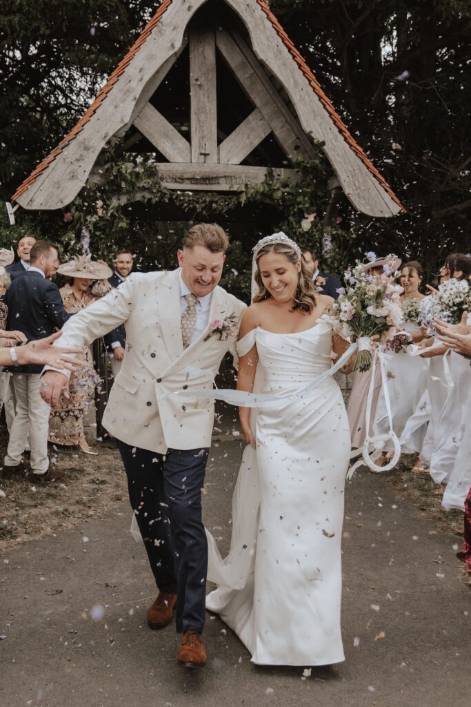 Wedding photographer in Yorkshire capturing confetti