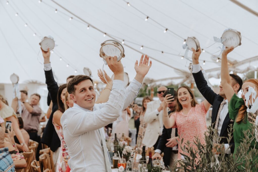 Bride and groom chatting with guests during the drinks reception