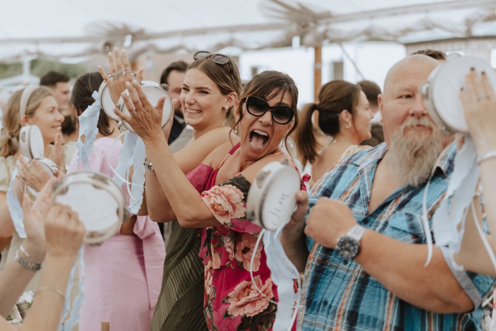 High energy entrance of guests as the bride and groom on their Yorkshire wedding day