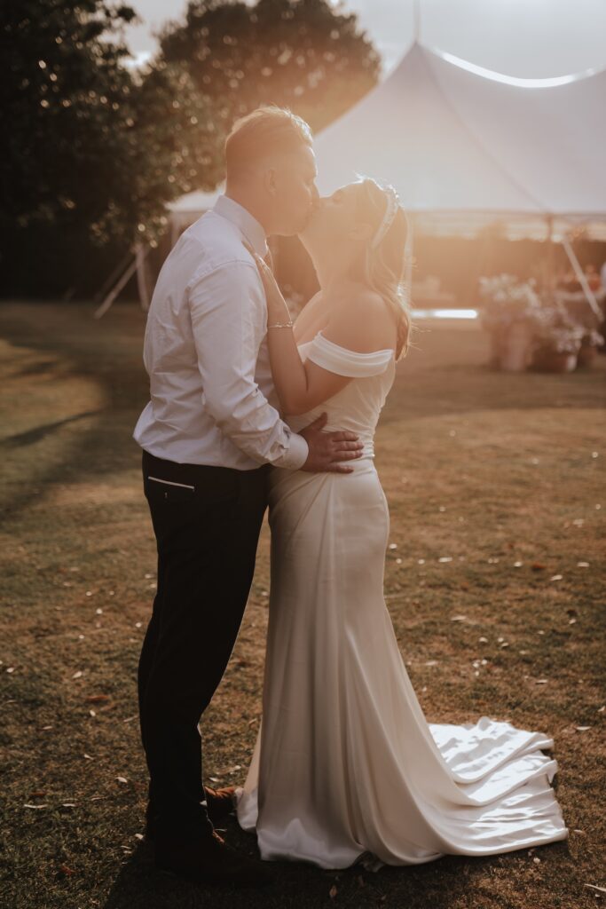 Yorkshire wedding photographer capturing golden hour with the bride and groom