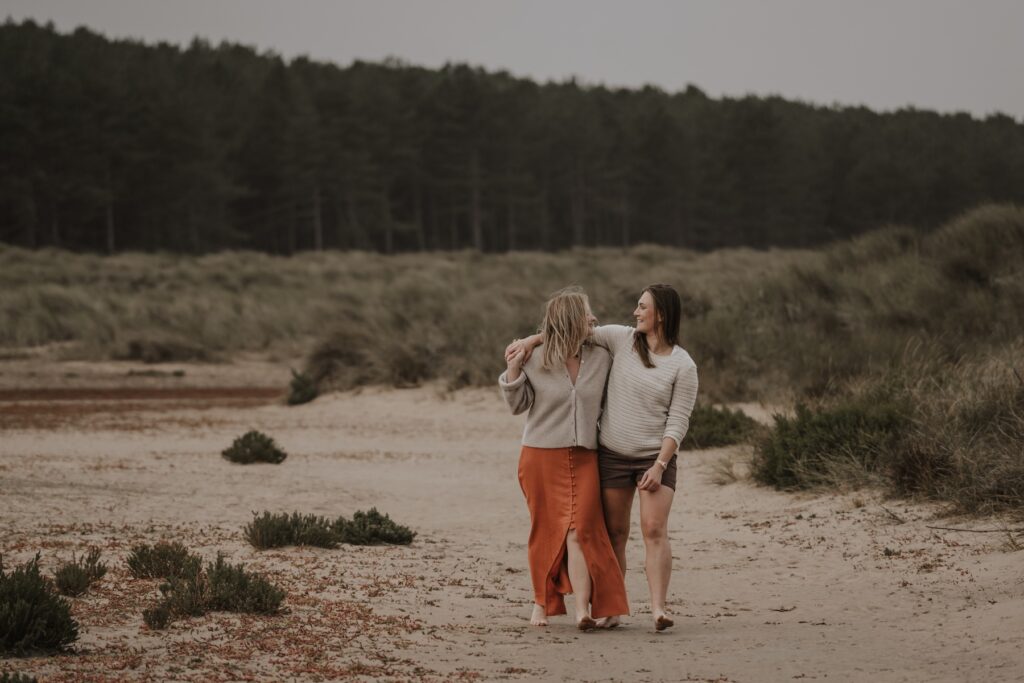 Norfolk wedding photographer capturing a couple on the beach