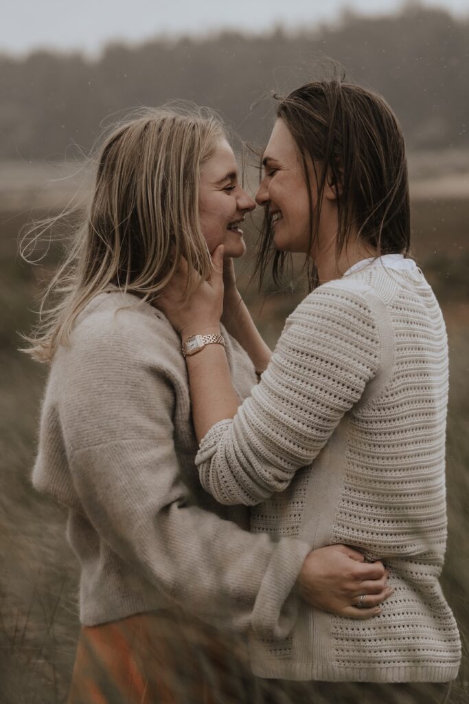 A couple together on Holkham beach in Norfolk