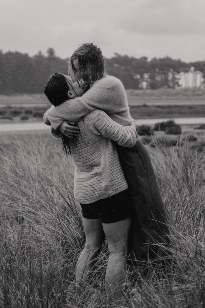 Engagement session capturing a couple at Holkham beach