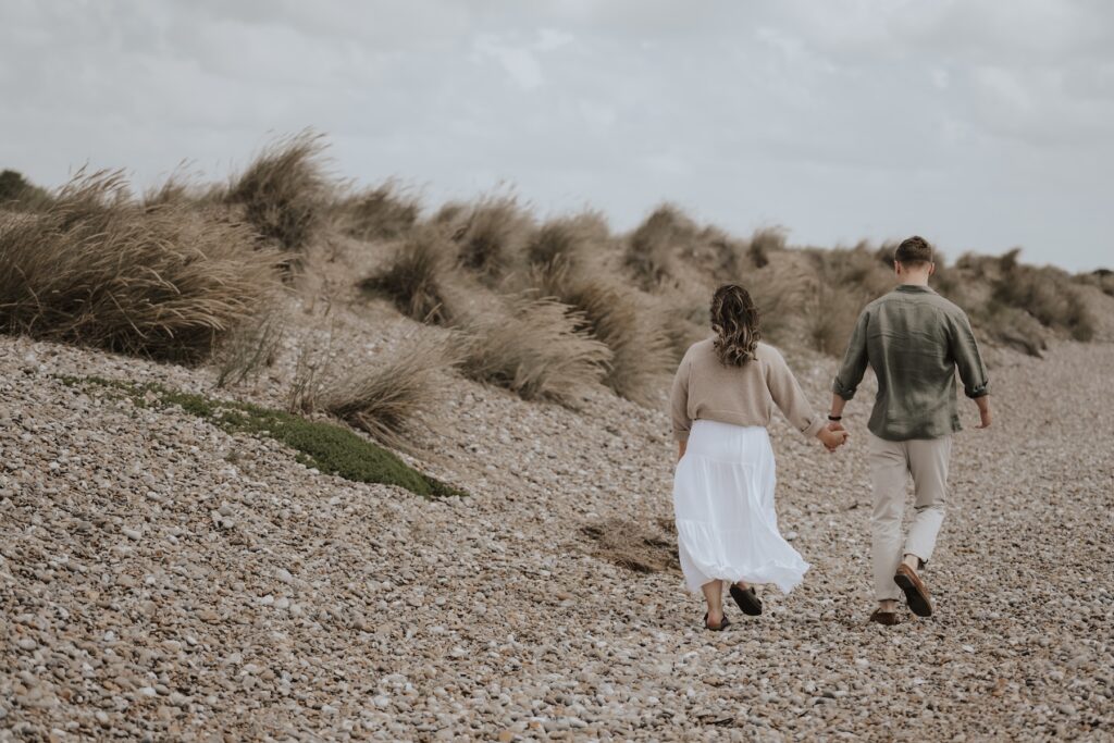 Suffolk engagement session capturing a couple in Southwold