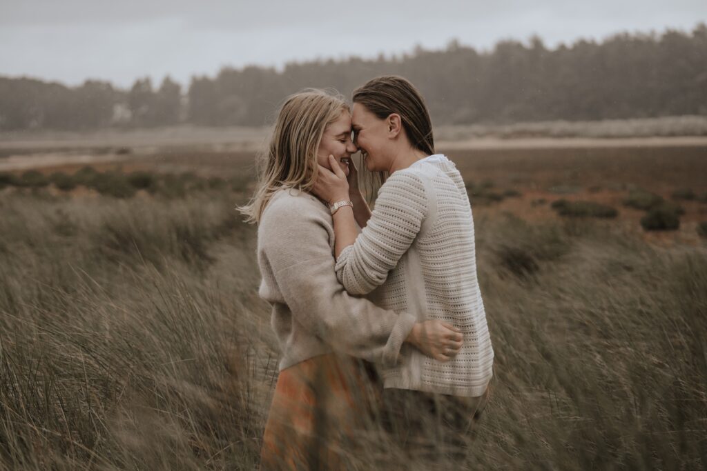 Holkham Beach engagement photographer capturing couple at beach