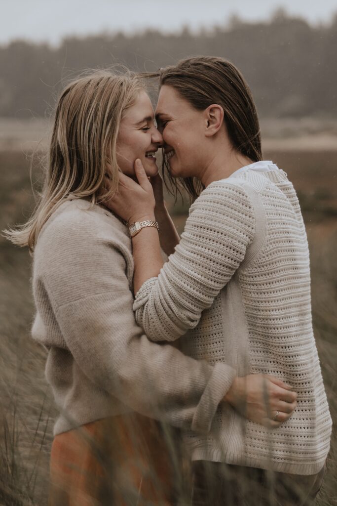 Norfolk engagement photographer capturing couples portraits at Holkham beach