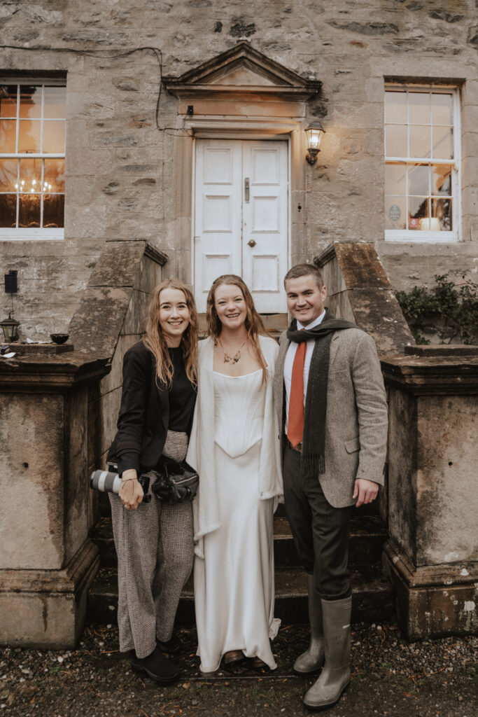 Wedding photographer with bride and groom for about me page