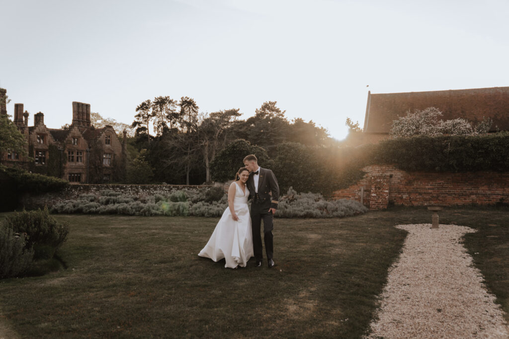 Seckford Hall wedding photographer in Suffolk at golden hour