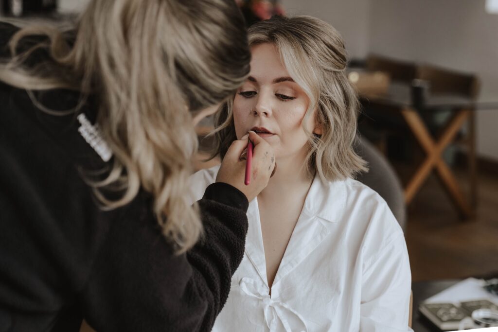 Bride and groom getting ready together for their Isle of Skye elopement