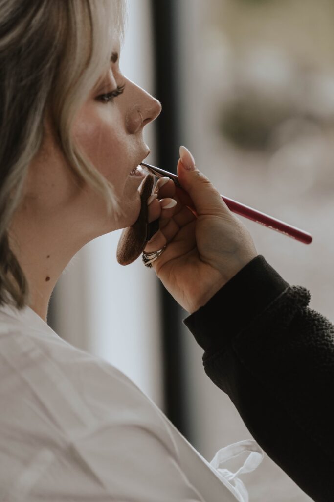 Bride having makeup done for Isle of Skye element