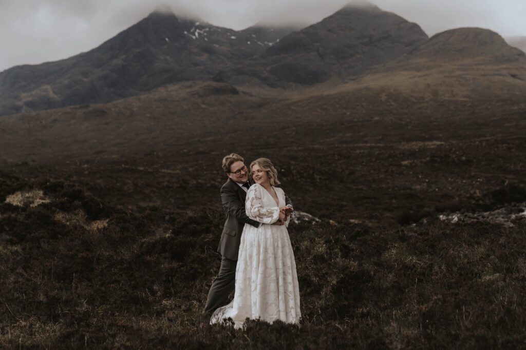 Bride and groom on the Isle of Skye celebrating their intimate elopement