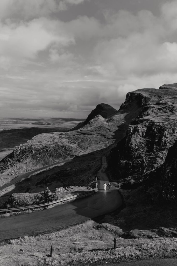 A couple on the road at Quiraing on the Isle of Skye