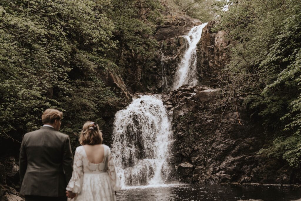 Hidden waterfall on the Isle of Skye during an intimate elopement