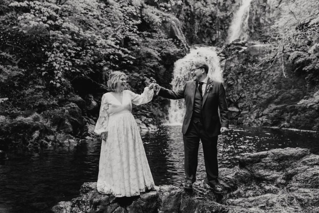 Bride and groom exploring hidden Skye locations