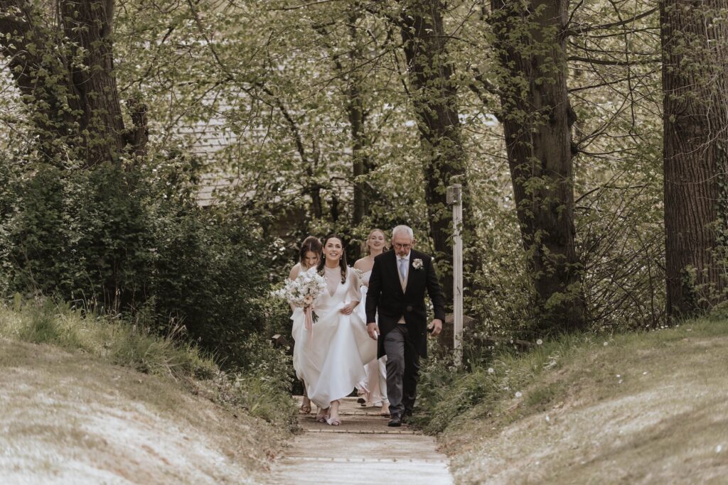 The bride arriving at the church ceremony in Suffolk