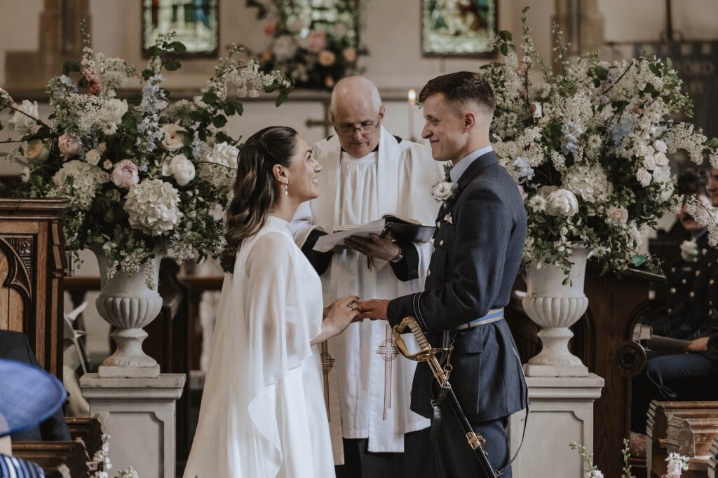 A bride and groom exchanging vows on their wedding day