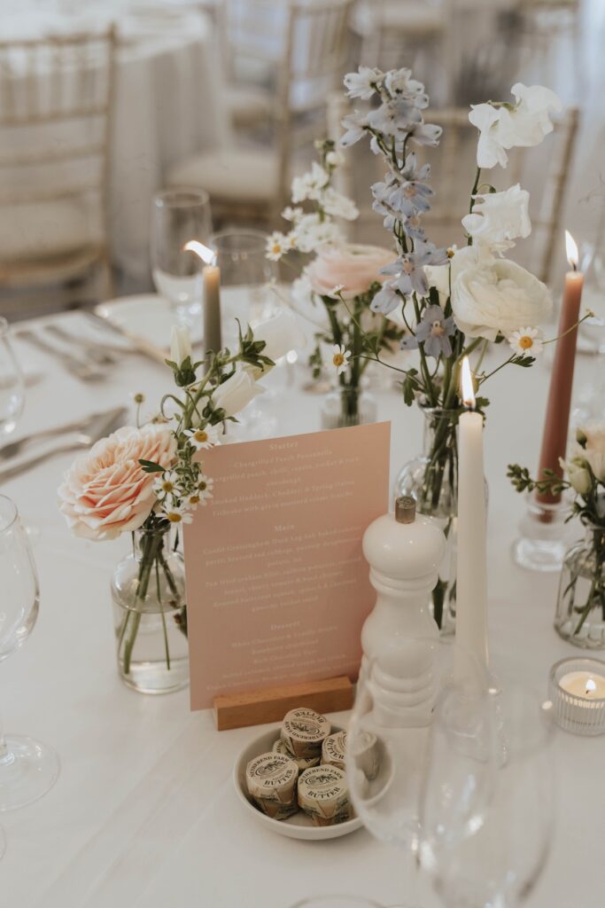 Wedding breakfast set up at Seckford Hall with candles
