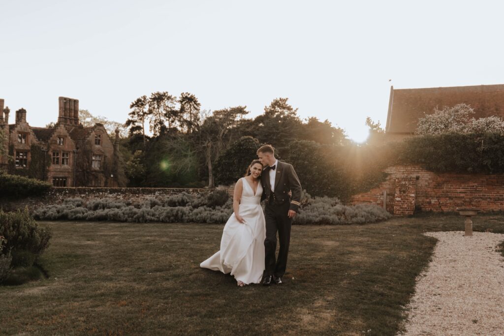 Golden hour couple portraits of a bride and groom at Seckford Hall