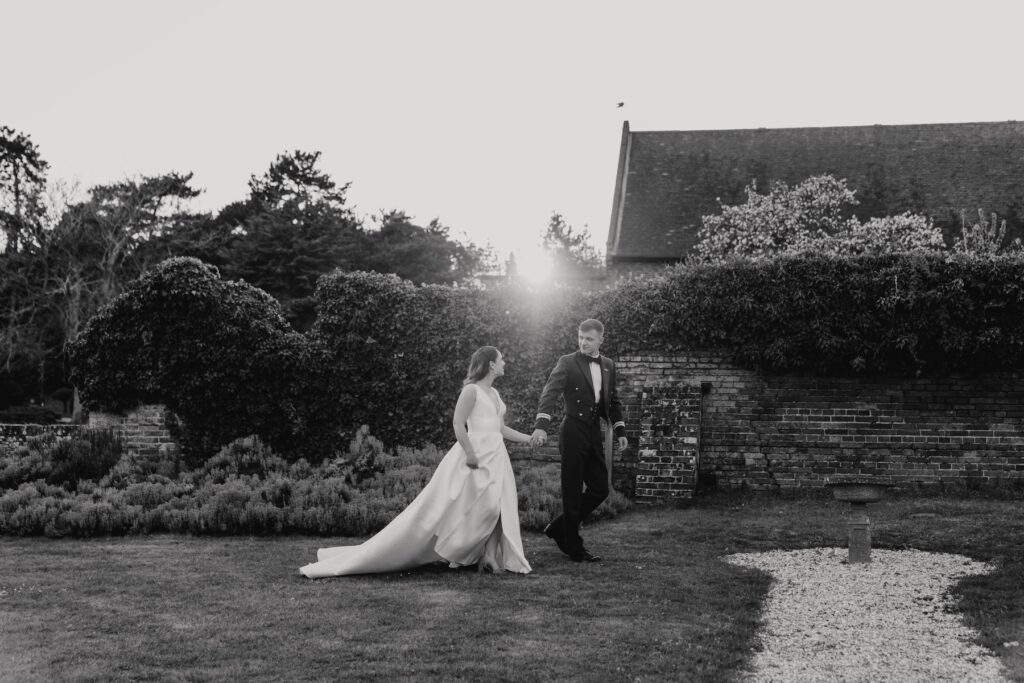 Golden hour couple portraits of a bride and groom at Seckford Hall in Suffolk